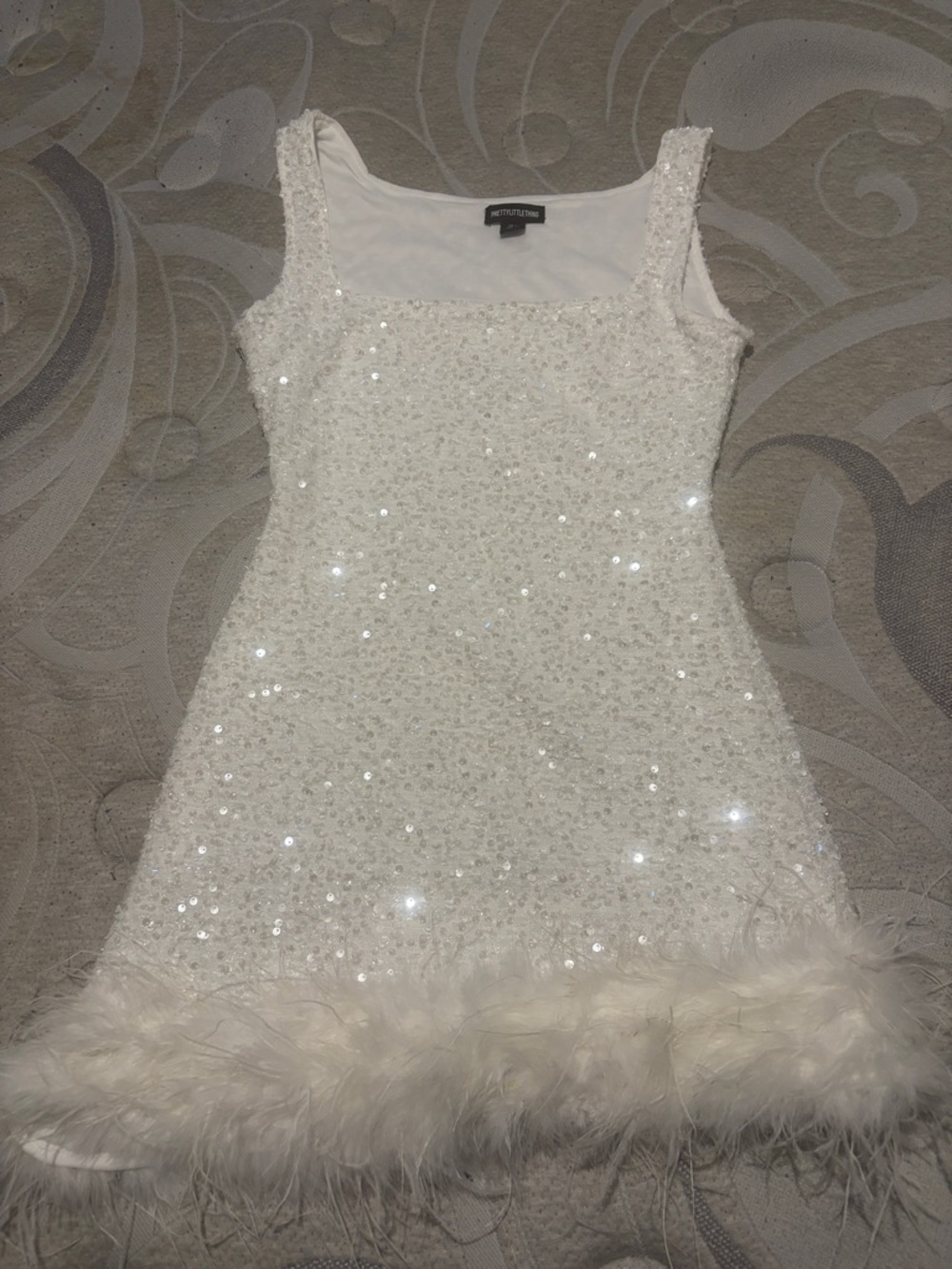 PrettyLittleThing White Sequin Dress with Feather Hem